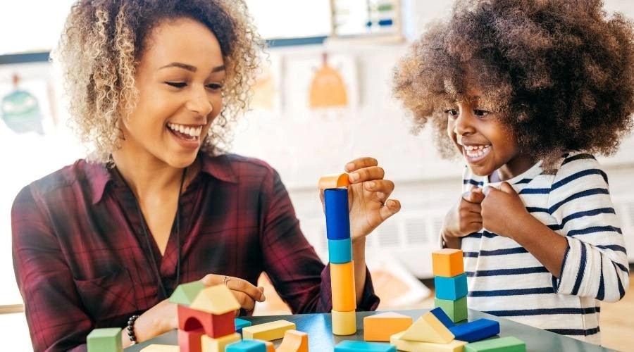 female SLP with child