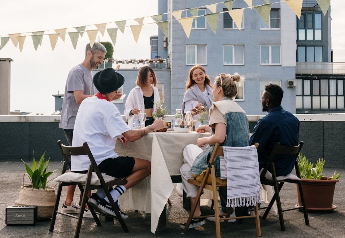 friends rooftop meal
