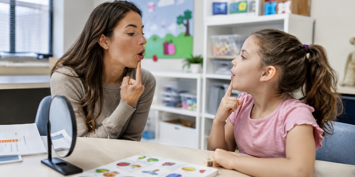 School SLP with young girl
